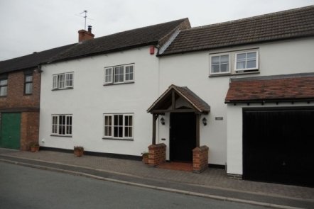 Ivory Woodgrain PVCu with Black Cill Ivory Woodgrain PVCu with Black Cill,