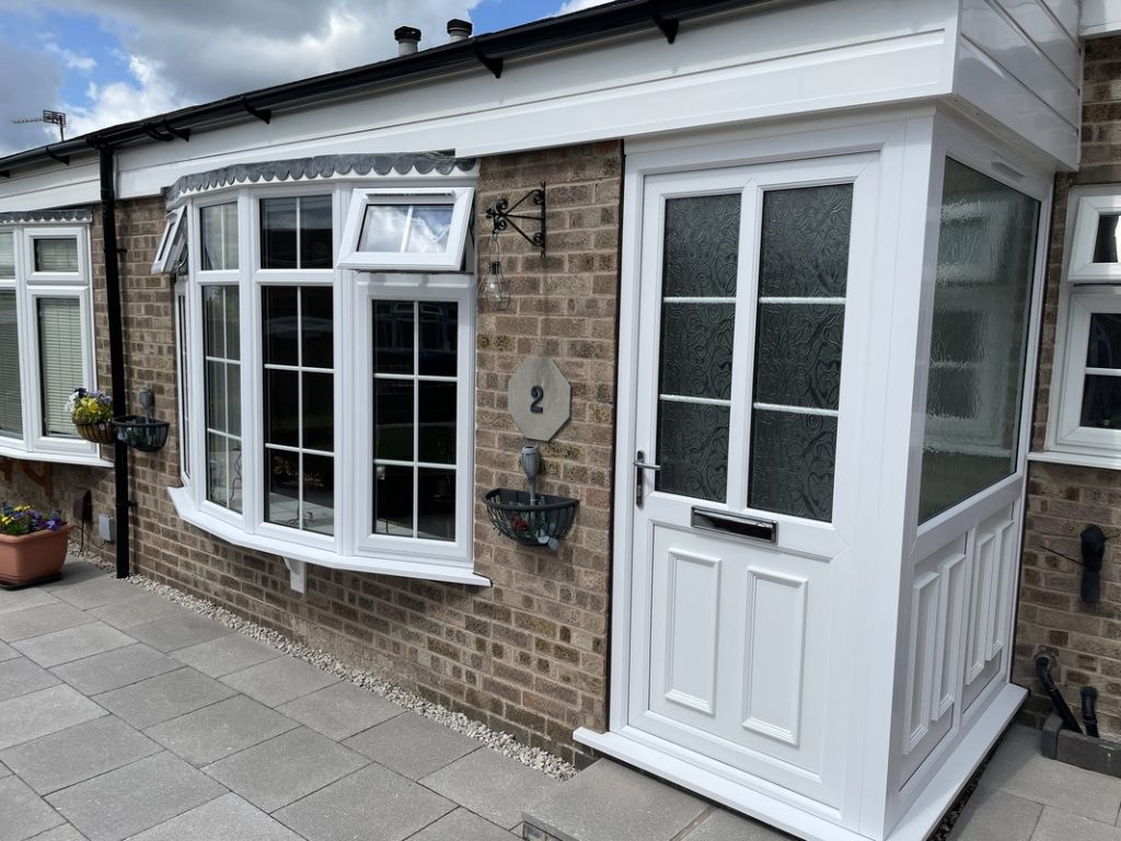 Entrance doors in Derby and Burton with white PVCu porch